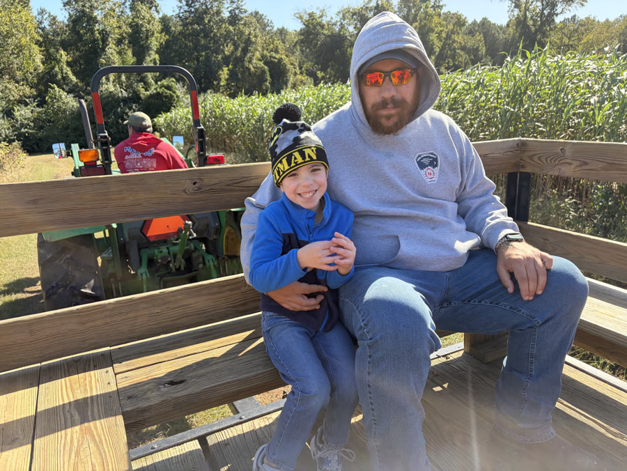 Robert and his son Robert IV on a hayride