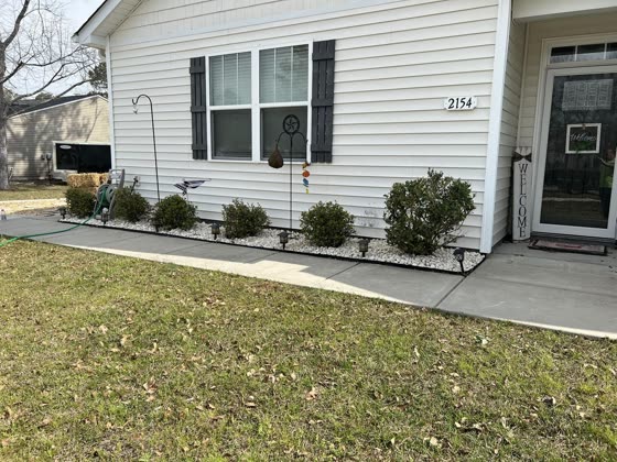 Front bed with new shrubs and mulch